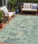 5' X 8' Teal Blue Linen And Pale Aqua Abstract Washable Indoor Outdoor Area Rug