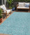 5' X 8' Teal Blue And Navy Blue Geometric Washable Indoor Outdoor Area Rug