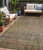 5' X 8' Artichoke Green And Hot Pink Floral Washable Indoor Outdoor Area Rug