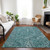 5' X 8' Teal Blue Aqua And Ivory Paisley Washable Indoor Outdoor Area Rug