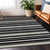 5' X 8' Black Ivory And Gray Striped Washable Indoor Outdoor Area Rug