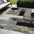 5' X 8' Black Taupe And Ivory Geometric Washable Indoor Outdoor Area Rug