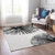 5' X 8' Black And Ivory Abstract Washable Indoor Outdoor Area Rug - 880016686395