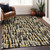 5' X 8' Black Gold And Ivory Abstract Washable Indoor Outdoor Area Rug