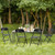 Set of Four Black Metal Outdoor Folding Stacking Dining Chairs
