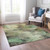 3' X 5' Beige Green And Artichoke Green Abstract Washable Indoor Outdoor Area Rug
