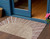3' X 5' Orange Copper And Terra Cotta Abstract Washable Indoor Outdoor Area Rug