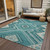 5' X 8' Teal Blue And Ivory Tribal Washable Indoor Outdoor Area Rug