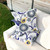 Set of Two 16" X 16" Blue and White Blown Seam Floral Indoor Outdoor Throw Pillow Polyester Home Accent