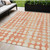 5' X 8' Coral And Ivory Abstract Washable Indoor Outdoor Area Rug