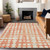 5' X 8' Coral And Ivory Abstract Washable Indoor Outdoor Area Rug