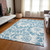 5' X 8' Denim and Ivory Floral Washable Non Skid Indoor Outdoor Area Rug