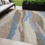 5' X 8' Taupe Tan And Blue Abstract Washable Indoor Outdoor Area Rug