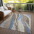 5' X 8' Taupe Tan And Blue Abstract Washable Indoor Outdoor Area Rug
