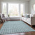 5' X 8' Teal Blue And Ivory Geometric Washable Indoor Outdoor Area Rug