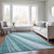 5' X 8' Teal Blue Turquoise And Aqua Striped Washable Indoor Outdoor Area Rug