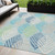 5' X 8' Teal Blue Aqua And Navy Blue Floral Washable Indoor Outdoor Area Rug