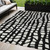5' X 8' Black And Ivory Abstract Washable Indoor Outdoor Area Rug - Black, Ivory