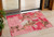 3' X 5' Coral Pink And Brown Abstract Washable Indoor Outdoor Area Rug