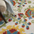 6' X 9' Ivory Green Red And Yellow Floral Indoor Outdoor Area Rug