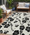 5' X 8' Ivory And Black Floral Washable Indoor Outdoor Area Rug