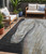 5' X 8' Ivory And Charcoal Animal Print Washable Indoor Outdoor Area Rug