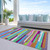 5' X 8' Lavender Orange And Lime Green Striped Washable Indoor Outdoor Area Rug