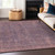 5' X 8' Mauve And Dark Purple Striped Washable Indoor Outdoor Area Rug