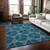 5' X 8' Teal Blue And Beige Geometric Washable Indoor Outdoor Area Rug