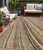 5' X 8' Taupe Beige And Brown Striped Washable Indoor Outdoor Area Rug