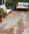 5' X 8' Tan Mauve And Ivory Abstract Washable Indoor Outdoor Area Rug