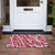 2' X 3' Red and White Abstract Washable Non Skid Indoor Outdoor Area Rug