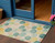 3' X 5' Teal Blue Yellow And Peach Geometric Washable Indoor Outdoor Area Rug