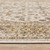 7' X 10' Ivory And Gold Oriental Area Rug With Fringe