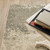 7' X 9' Beige And Ivory Abstract Shag Area Rug