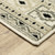 5' X 7' Ivory Grey Black And Ivory Southwestern Power Loom Stain Resistant Area Rug