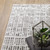 7' X 10' Gray and White Abstract Power Loom Area Rug