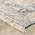 5' X 8' Blue And Beige Oriental Hand Loomed Stain Resistant Area Rug With Fringe