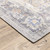 5' X 7' Blue Gold Grey Orange Yellow And Purple Oriental Power Loom Stain Resistant Area Rug