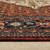 3' X 5' Red Blue Ivory And Orange Oriental Power Loom Stain Resistant Area Rug With Fringe