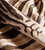 5' X 7' Beige and Brown Cowhide Hand Knotted Area Rug