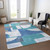 5' X 8' Teal Blue And Ivory Geometric Washable Indoor Outdoor Area Rug