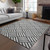 5' X 8' Black And Ivory Geometric Washable Indoor Outdoor Area Rug