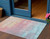 3' X 5' Salmon And Beige Abstract Washable Indoor Outdoor Area Rug