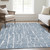 5' X 8' Blue And Ivory Abstract Washable Indoor Outdoor Area Rug