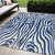 5' X 8' Navy Blue And Ivory Animal Print Washable Indoor Outdoor Area Rug