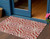 3' X 5' Red Beige And Ivory Floral Medallion Washable Indoor Outdoor Area Rug