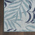 4' X 6' Navy Blue Ivory And Blue Palm Leaf Indoor Outdoor Area Rug
