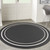 4' Black And Ivory Round Indoor Outdoor Area Rug