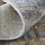 10' X 13' Tan And Blue Abstract Distressed Area Rug